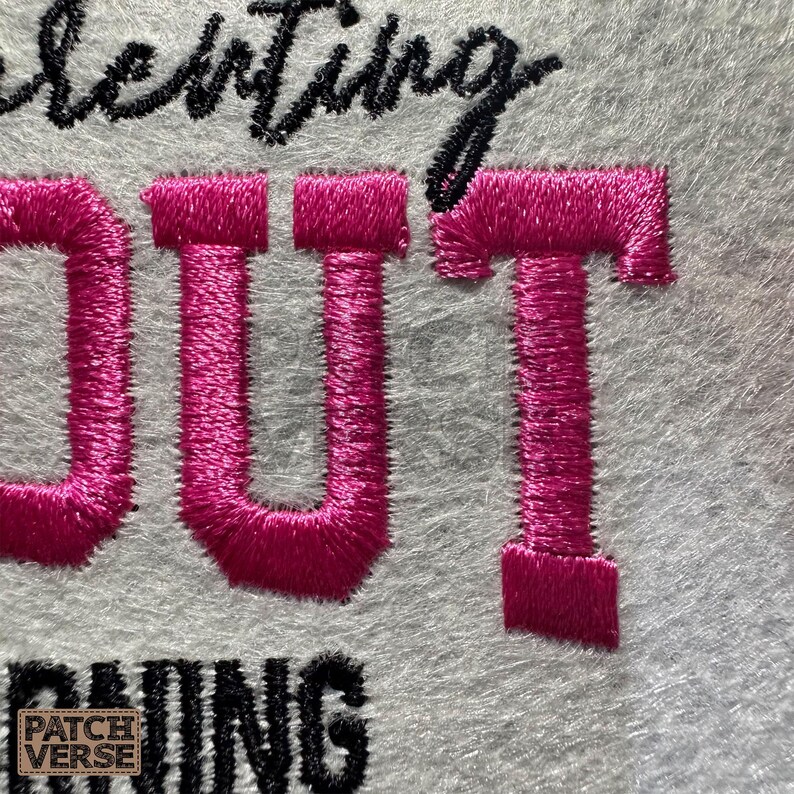 Gentle Parenting Dropout flat embroidery machine design featuring bold varsity lettering with script overlay stitched on a hat hoop setup. Funny mom life cap embroidery file perfect for dad hats, snapbacks and trucker hats. Digital embroidery design available in PES DST EXP VP3 HUS JEF XXX SEW formats for clean professional hat embroidery production..