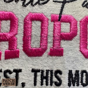 Gentle Parenting Dropout flat embroidery machine design featuring bold varsity lettering with script overlay stitched on a hat hoop setup. Funny mom life cap embroidery file perfect for dad hats, snapbacks and trucker hats. Digital embroidery design available in PES DST EXP VP3 HUS JEF XXX SEW formats for clean professional hat embroidery production..