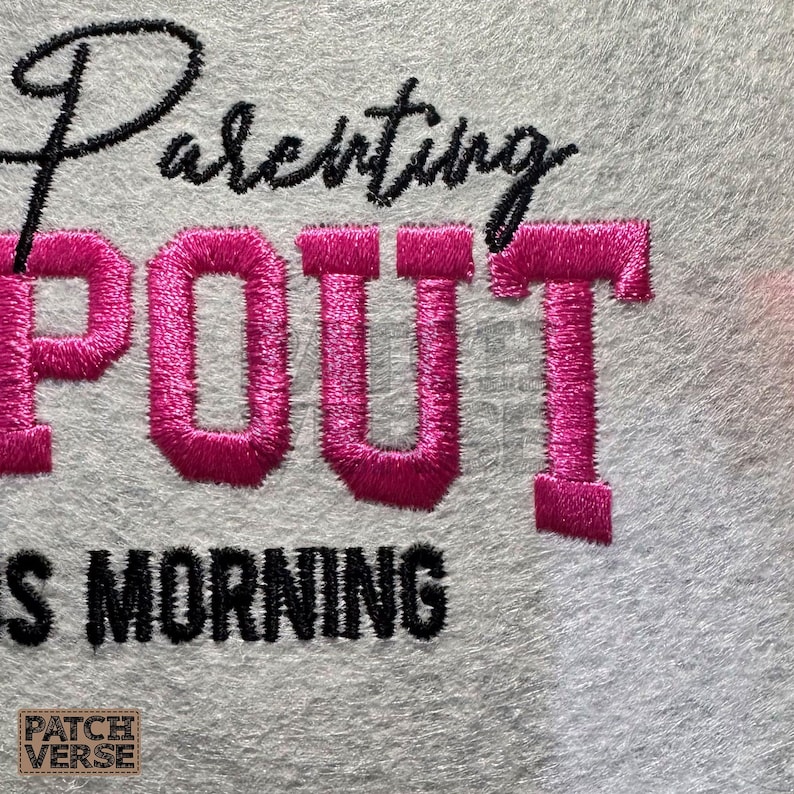 Gentle Parenting Dropout flat embroidery machine design featuring bold varsity lettering with script overlay stitched on a hat hoop setup. Funny mom life cap embroidery file perfect for dad hats, snapbacks and trucker hats. Digital embroidery design available in PES DST EXP VP3 HUS JEF XXX SEW formats for clean professional hat embroidery production..