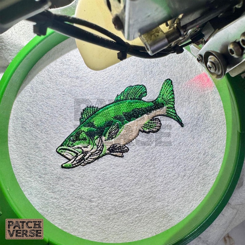Bass fish embroidery design file stitched in a realistic largemouth bass style, professionally digitized for hats and caps. This fishing embroidery file is optimized for dad hats, trucker hats, and snapback caps, featuring clean outlines and smooth fills for outdoor, angler, and fishing brand projects. Perfect for machine embroidery on fishing hats, custom caps, and 
outdoor apparel.