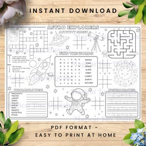 May include: Black and white Astro Explorers activity sheet with a rocket, astronaut, and planets. Includes crossword, word search, unscramble, and writing practice sections. Features the text "Instant Download" and "Easy to Print at Home."
