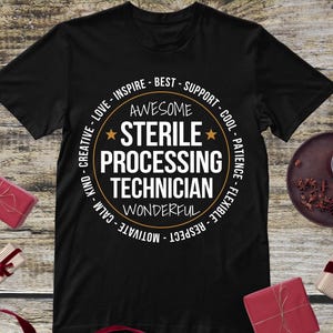 May include: Black t-shirt with a circular design that reads "Awesome Sterile Processing Technician" in white text. The design is surrounded by words like "Inspire," "Support," and "Respect." The shirt is displayed on a wooden surface with gift boxes.