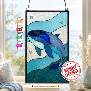 May include: A rectangular stained glass panel featuring a blue whale swimming through stylized waves in shades of teal and light blue. The design includes small circular bubbles and is framed in black. Text icons for SVG, PDF, JPG, PNG and HOBBY LICENSE are visible.