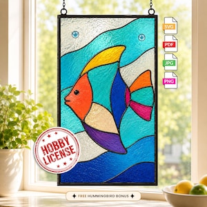 May include: A rectangular stained glass panel featuring a multi-colored fish with an orange head, yellow dorsal fin, and blue, purple, and pink body sections. The background consists of wavy blue and white glass patterns with small circular accents.