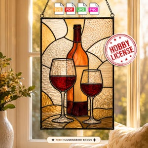 May include: A rectangular stained glass panel featuring a wine bottle and two wine glasses filled with red liquid. The design uses amber, gold, and clear textured glass pieces. A circular red stamp reads HOBBY LICENSE, and text includes SVG, PDF, JPG, PNG.
