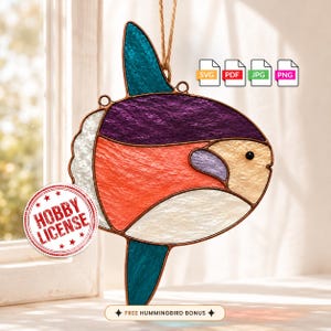 May include: A stained glass suncatcher shaped like a sunfish with purple, orange, white, and teal textured glass panels held together by copper foil. It features a small black eye and hangs from a twine loop. Includes SVG, PDF, JPG, and PNG icons.