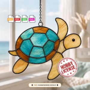 May include: A stained glass sea turtle suncatcher featuring a turquoise and amber shell with light tan flippers and head. The piece hangs from a metal chain and includes digital file icons for SVG, PDF, JPG, and PNG, plus a Hobby License stamp.
