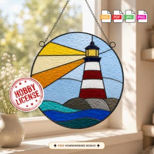 May include: A circular stained glass suncatcher featuring a lighthouse with red and white horizontal stripes, set against a light blue sky and dark blue waves. Yellow and orange light beams radiate from the lighthouse. Includes a hanging chain.