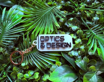 Optics & Design Keychain –  TV Show Collectible – Key Chain prop