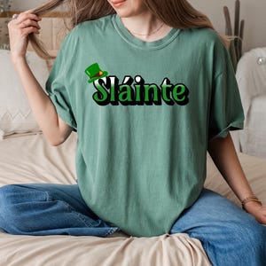 St. Patrick&#39;s Day Sláinte T-shirt for Celebrations, Shamrock Shirt, Irish Pride Shirt, Gift for St. Patrick&#39;s Day, Four Leaf Clover Tee