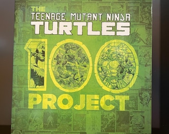 The Teenage Mutant Ninja Turtles 100 Project HARDCOVER, signed by Ron Chan & Cat Farris