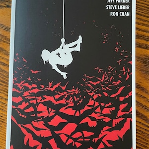 May include: A black and white comic book cover with the title "UNDERGROUND" in large white letters. The cover features a silhouette of a person hanging from a rope against a black background with a red and black pattern of bats in the foreground.