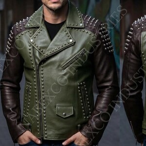 May include: Olive green and brown leather jacket with silver studs. The jacket features a classic asymmetrical zipper closure, a notched collar, and multiple pockets. The shoulders are accented with rows of silver studs, adding a bold, edgy look. The sleeves are brown.