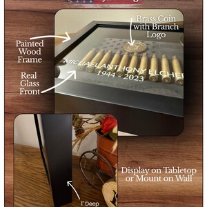 May include: A black painted wood shadow box with a glass front, featuring a row of brass military casings, a brass coin with a branch logo, and the white text MICHAEL ANTHONY ELCHER 1944-2023. The frame is 1 inch deep for tabletop or wall display.