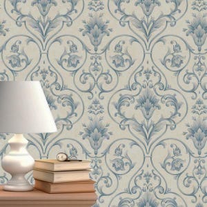 May include: A beige wallpaper with a blue and white damask pattern. The pattern features intricate floral designs and swirls.