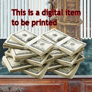 May include: A digital graphic featuring multiple stacks of one hundred dollar bills arranged in a pile. The text "This is a digital item to be printed" is displayed in red letters with a black outline across the top of the image.