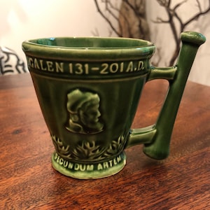 Vintage 1960&#39;s McCoy Pottery Green Ceramic Mortar & Pestle Coricidin Medicine Advertising Coffee Mug for Schering Pharmaceuticals
