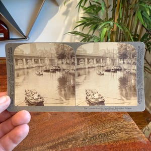 Tarjeta fotográfica estereográfica antigua de c. 1894: La Catedral desde el Gran Canal de Róterdam, Holanda. Fotografía estereográfica de Underwood & Underwood Publishers.