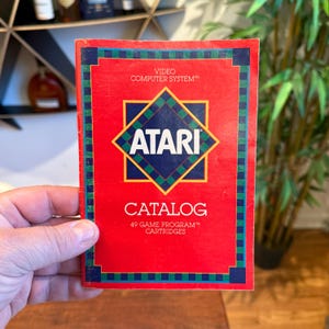 Vintage c. 1982 ATARI Catalog Video Computer System 49 Game Program Cartridge Paperback Booklet - 44 pages - Retro 1980's Video Game Decor