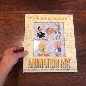 Libro de arte de animación vintage de Warner Bros., c. 1997: ilustraciones de dibujos animados de Looney Tunes y Batman Superman: libro de Bug Bunny, Daffy Duck, Porky Pig