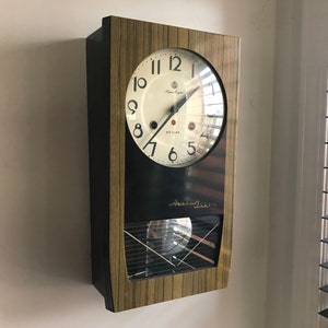 Eight Day Spring Wound Pendulum Clock With Key Table or Wall Mount by the  New England Clock Company 