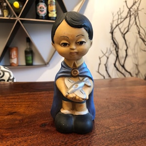 Vintage 1970&#39;s Hand Painted Little Dark Haired Boy with Blue Superhero Cape & Toy Airplane Figurine by CARE INC. - Vintage Boy&#39;s Room