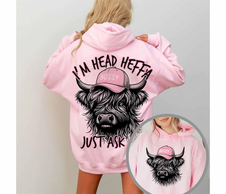 May include: Pink hoodie with a black and white Highland cow wearing a pink hat that says "Bossy" and the text "I'm Head Heffa Just Ask".