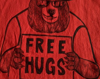 Free Hugs Bear Dad Jokes Woodcut printed tshirt sizes small to 5xl any color shirt Black ink on tshirt handmade hand carved