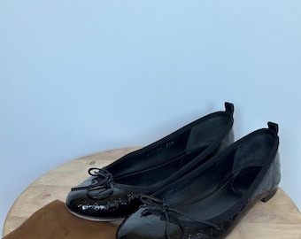 Bailarinas Gucci Microguccissima de charol negro