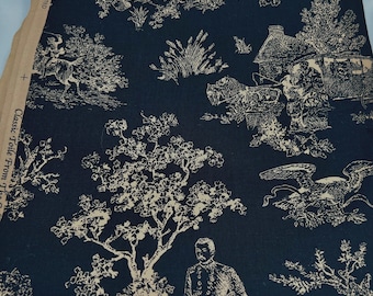 May include: A dark navy blue fabric featuring a cream-colored toile pattern of historical scenes, including a person in a military uniform, a horse-drawn carriage, a rider on horseback, and an eagle. The selvage edge reads Classic Toile From The.