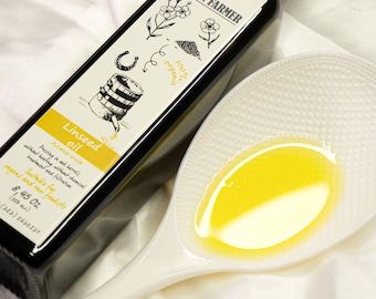 Flaxseed Oil. Organic Fresh Flaxseed Oil Live Raw Unfiltered Cold Pressed made to order. Cold-pressed in oak barrels from premium flax seeds