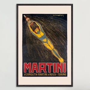 Può includere: Una pubblicità Martini vintage incorniciata. L'opera presenta una figura stilizzata che si tuffa con una bottiglia, su uno sfondo scuro con linee gialle radianti. La parola "MARTINI" è ben visibile in rosso, con testo aggiuntivo in basso.