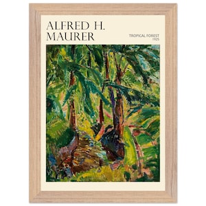 May include: Framed art print of an Alfred H. Maurer painting titled "Tropical Forest" from 1925. The artwork depicts a vibrant jungle scene with lush green foliage, brown tree trunks, and yellow highlights. The print is set in a light brown wooden frame.