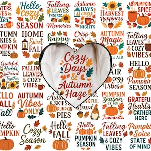 May include: White sweatshirt with the text "Cozy Days & Autumn Haze" in a heart-shaped design. Surrounding the sweatshirt are various fall-themed graphics and phrases, including pumpkins, leaves, and the words "Hello Fall".