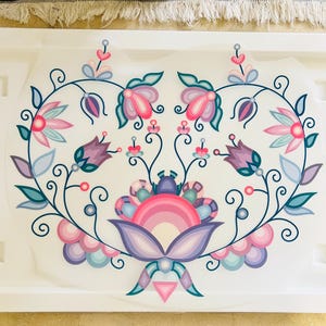 May include: A white tray with a colorful floral design. The design features pink, purple, and teal flowers and leaves arranged in a symmetrical pattern. The flowers have multiple layers of petals and are surrounded by swirling vines.