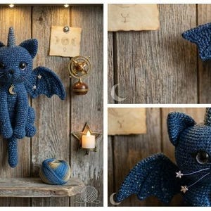 May include: A dark blue crocheted dragon cat plush toy with a single horn, bat-like wings, and a crescent moon pendant. The whiskers are adorned with small star charms. A sign next to the toy reads: Astra the Celestial Dragon Cat Crochet Pattern.