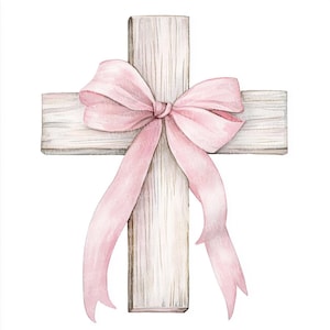 Puede incluir: Una cruz de madera blanca con una cinta rosa atada en un lazo en el centro. La cinta está atada en un lazo suelto con los extremos de la cinta que fluyen por los lados de la cruz.