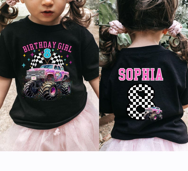 May include: Black t-shirt with a colorful graphic featuring a monster truck with a unicorn design, checkered flags, and the text "BIRTHDAY GIRL 8". The back of the shirt displays the name "SOPHIA" and a checkered number 8.