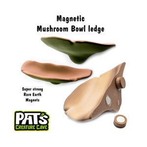 May include: Three mushroom-shaped ledges in shades of green, brown, and tan, with a magnetic base. The text on the image reads "Magnetic Mushroom Bowl ledge" and "Super strong Rare Earth Magnets". The logo for Pat's Creature Cave is also visible.