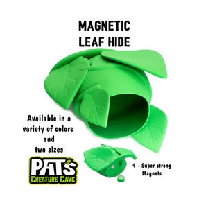 May include: A bright green, leaf-shaped pet hideaway with the text "MAGNETIC LEAF HIDE." The product is available in multiple colors and two sizes. The image also shows a smaller leaf with a magnet and the text "4 - Super strong Magnets."