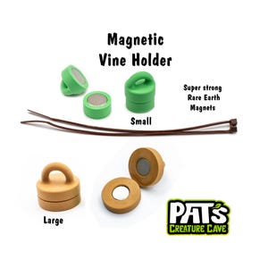 May include: Magnetic Vine Holder set featuring small green and large tan cylindrical magnetic mounts with loops, two brown zip ties, and text labels reading Magnetic Vine Holder, Small, Large, Super strong Rare Earth Magnets, and PAT'S CREATURE CAVE.