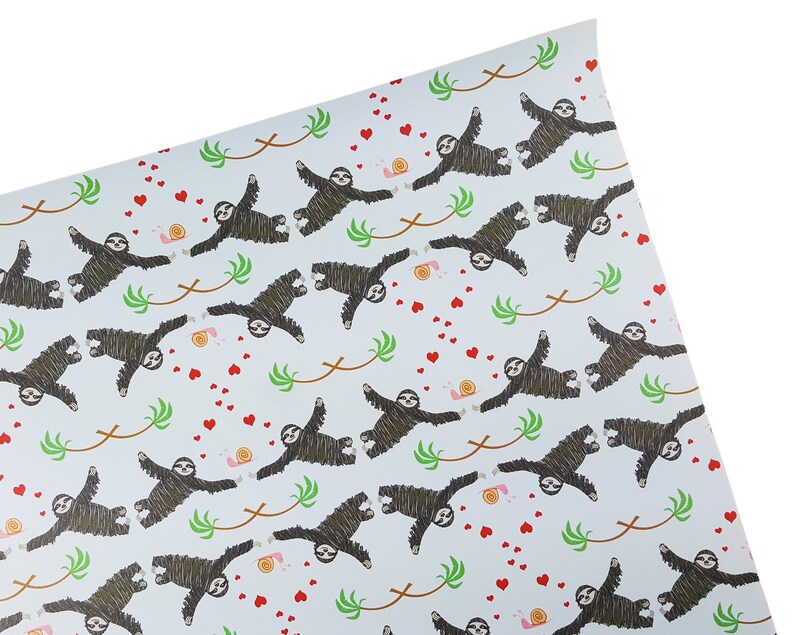 May include: Blue wrapping paper with a repeating pattern of sloths hanging from branches with hearts and snails.