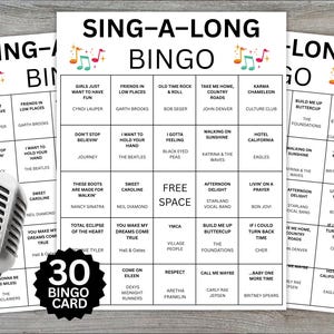 May include: A set of Sing-A-Long Bingo cards featuring a grid of song titles and artists, including classics like Girls Just Want To Have Fun and Hotel California. A silver microphone stands in the foreground, and a black badge reads 30 Bingo Card.