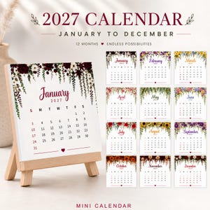 May include: A 2027 mini calendar displayed on a small wooden easel. The calendar features twelve monthly pages, each decorated with unique floral illustrations at the top. The text reads 2027 CALENDAR, JANUARY TO DECEMBER, 12 MONTHS, ENDLESS POSSIBILITIES.