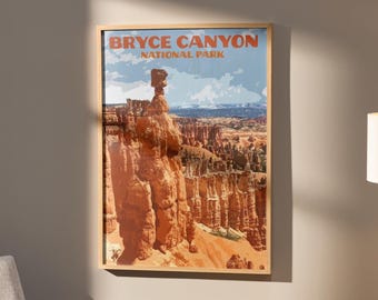 May include: Framed print of Bryce Canyon National Park. The artwork features a landscape of orange rock formations under a blue sky with white clouds. The text "BRYCE CANYON NATIONAL PARK" is printed at the top in orange.