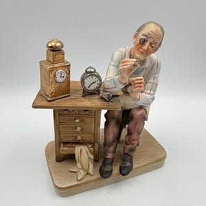 Watchmaker Figurine Statue - Etsy