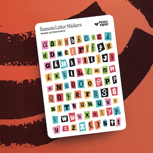 May include: A sheet of ransom note style alphabet stickers with a variety of fonts and colors. The stickers are on a white background with the text "Ransom Letter Stickers" and "Mixed Letter Fonts" at the top. The text "Petty Paper" is in a heart shape at the top right corner.