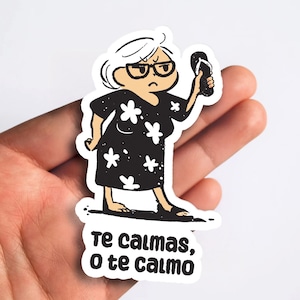 May include: A sticker featuring an illustration of an elderly person wearing glasses and a black dress with white flower accents, holding a flip-flop. The text "Te calmas, o te calmo" is at the bottom.