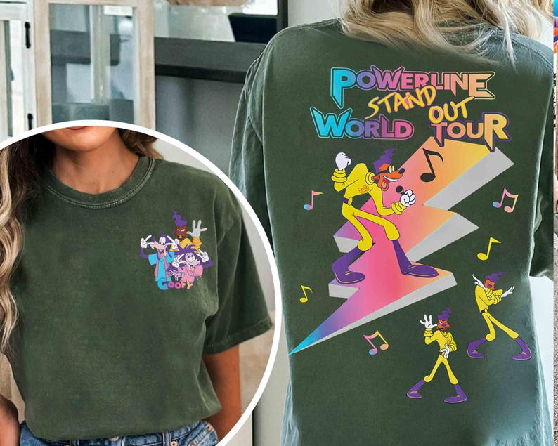 May include: A green t-shirt with a cartoon image of Goofy and his friends. The back of the shirt has a graphic of a cartoon character standing on a lightning bolt with the text "Powerline Stand Out World Tour".