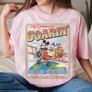 Retro Soarin Around The World Comfort Colors Shirt, Mickey Donald Pluto Airplane Tee, Disney Epcot Ride Outfits, Disneyland Family Trip 2026 image 4